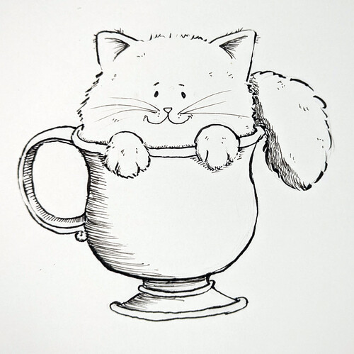 A kitten in a cup